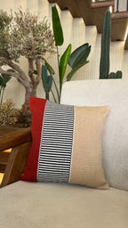 Hand weaved burgundy cushion