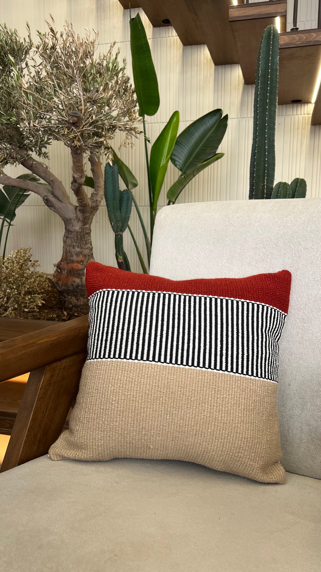 Hand weaved burgundy cushion