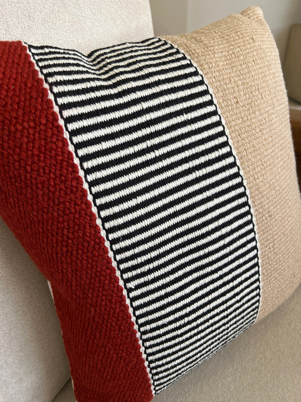 Hand weaved burgundy cushion