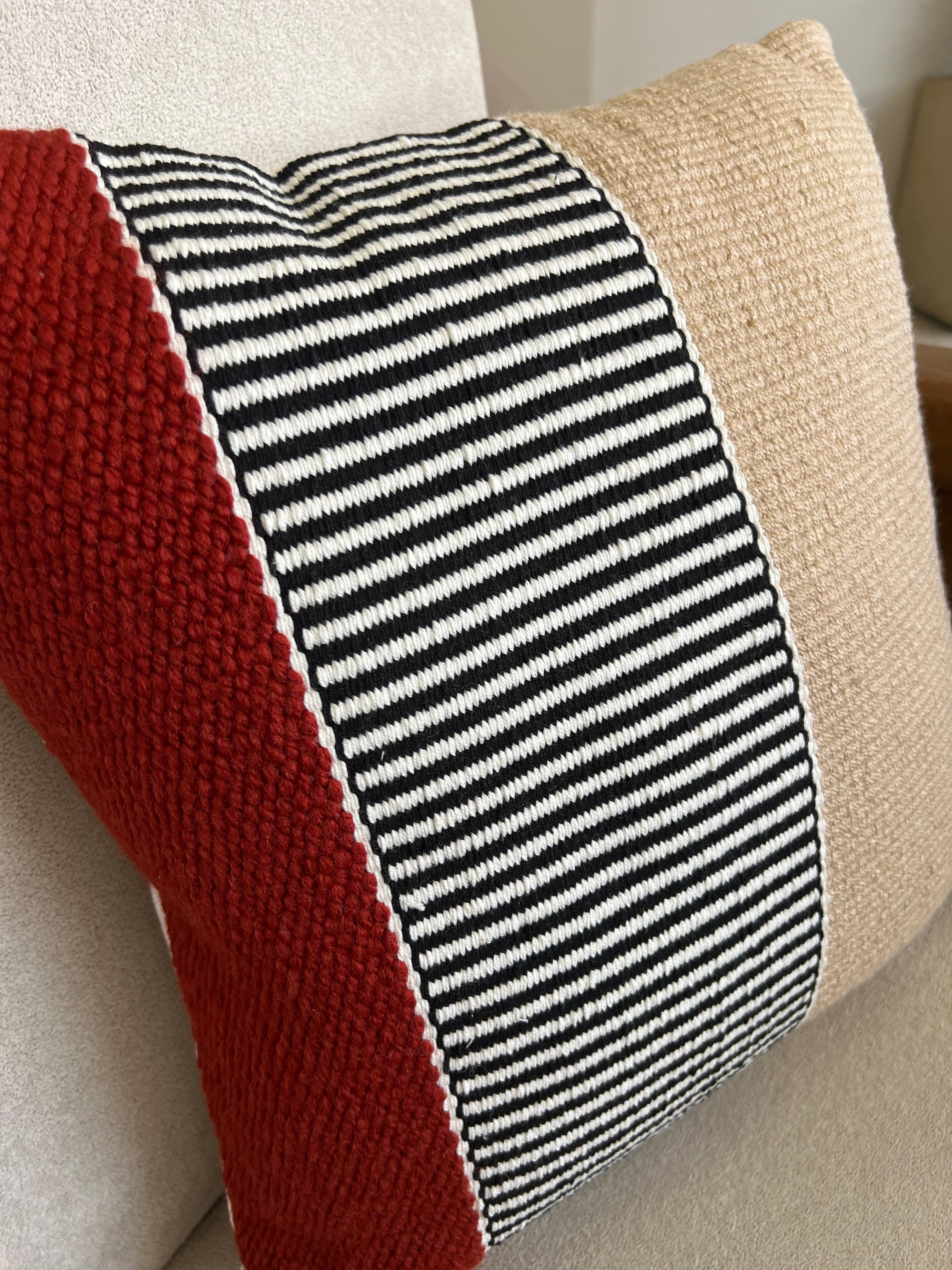 Hand weaved burgundy cushion